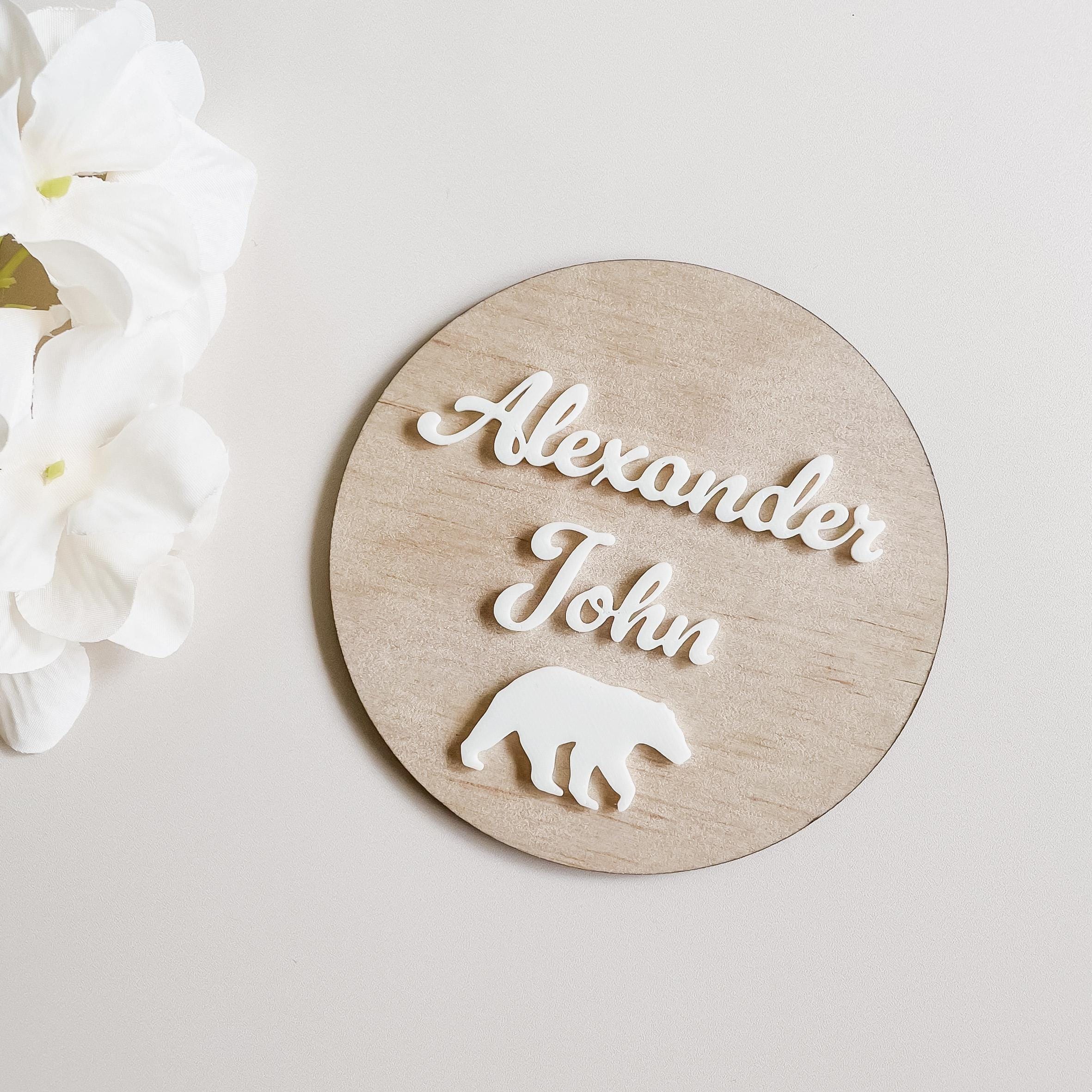 Personalised wooden baby announcement plaque customised with your chosen name. Also includes a bear motif.