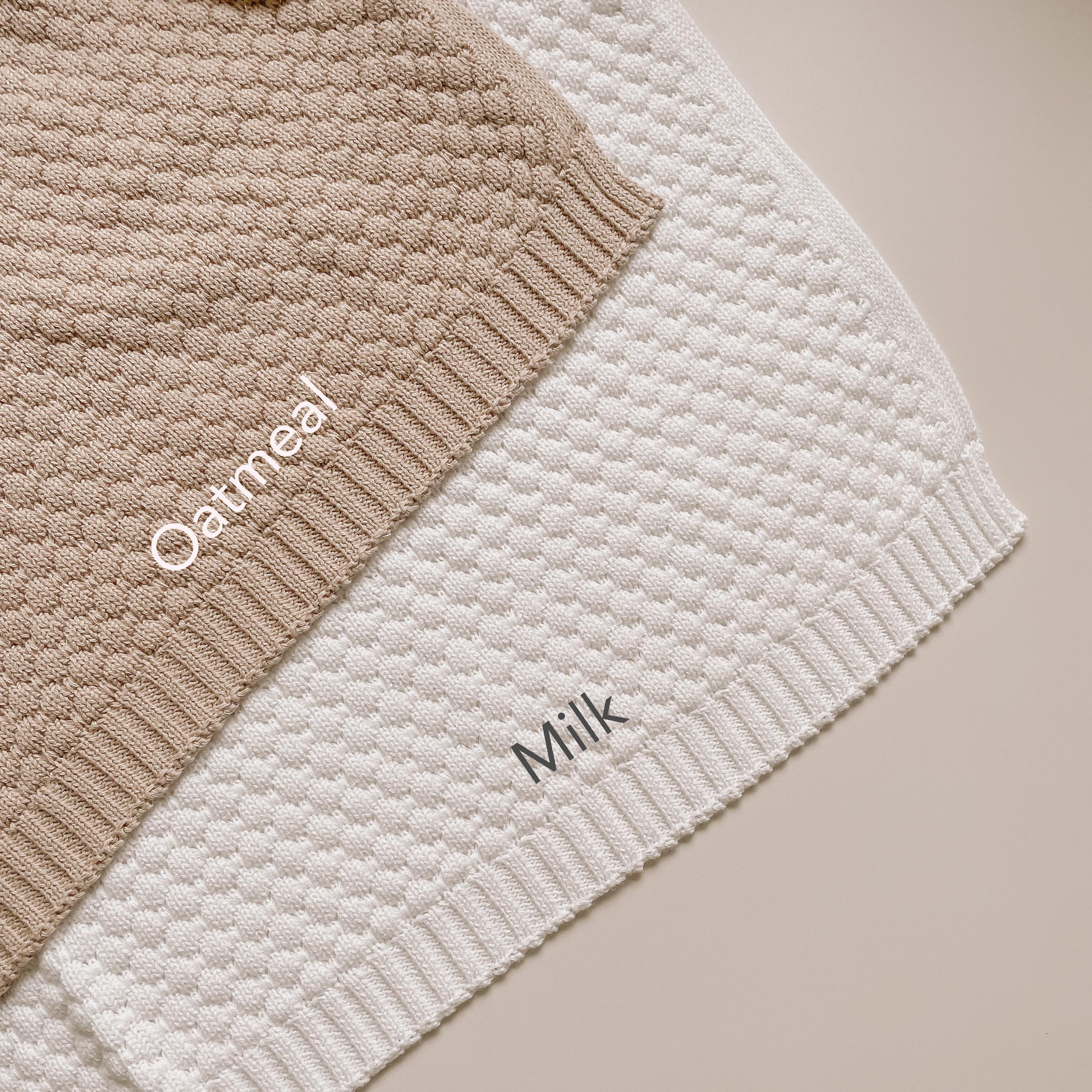 Soft cotton knit baby blankets available in colour Oatmeal or Milk which suits either a boy or girl. Makes an ideal gift for a new baby.